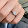 .50 Ct Marquise Moissanite & .12 Ctw Diamond Halo Engagement Ring